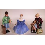 A group of three Royal Doulton figures including girl evacuee, boy evacuee and another, 21cm high,