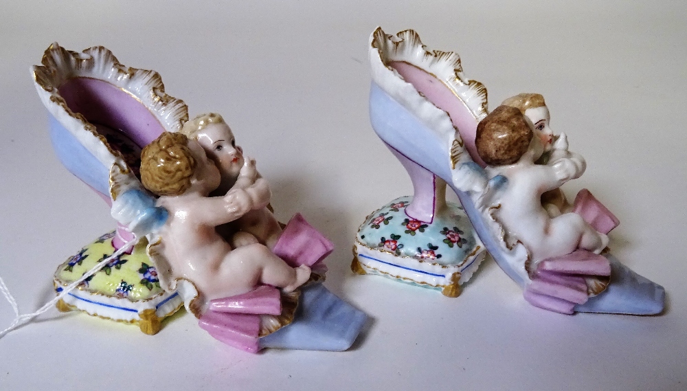 A Berlin porcelain cabinet cup painted with two women and a putto; a Meissen tea cup, - Image 8 of 17