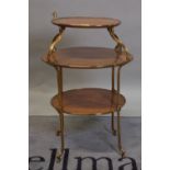 A 19th century Continental mahogany and gilt metal mounted three tier etagere,