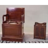 An early 20th century mahogany box commode and a small oak wall cabinet with carved decoration,