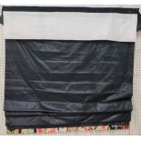 A Roman blind in dark blue with a colourful lower border, 125cm wide x 200cm long.