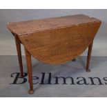 An 18th century and later oak drop flap dining table, on pad feet, 104cm wide x 70cm high.