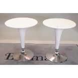 A pair of modern white lacquer circular occasional tables on chrome bases,