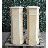 A pair of modern faux marble plaster columns, 34cm wide x 96cm high (a.f.), (2).