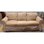 A modern hardwood framed three seater sofa on block supports, 215cm wide x 73cm high.