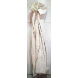 A pair of modern cream lined and interlined curtains, each 140cm wide x 275cm drop.