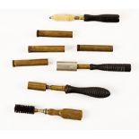 Four shotgun chamber cleaning brushes (8)