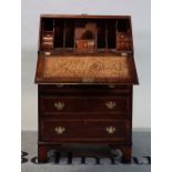 A late 19th century mahogany bureau