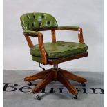 A modern mahogany framed office armchair with button back leather upholstery