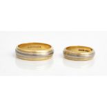 A pair of 18ct two colour gold wedding rings, each of triple band design, London 1998, the...