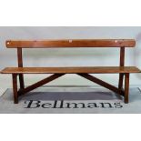 A late 19th century pitch pine bench