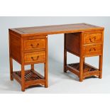 A 20th century Chinese hardwood pedestal side cabinet of four short drawers above cockpen...