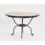 A circular garden table the mosaic compass top on a parcel gilt wrought iron base, 112cm...