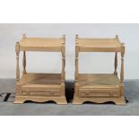 A pair of modern two tier bedside tables with single drawer bases