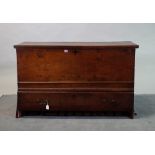 An 18th century oak mule chest, with moulded hinged top over one long drawer