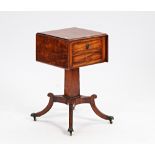 A William IV plum pudding mahogany drop flap two drawer work table on four downswept supports...