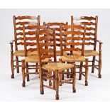 A set of six rush seated ash ladder back dining chairs (6).