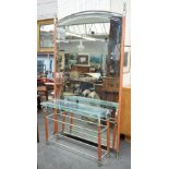 A 20th century bevelled glass floor standing mirror and a matching console table.