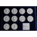 A cased set of ten Meissen white biscuit commemorative coins, circa 1990's, nine depicting ...