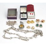 A collection of costume jewellery; comprising a pair of gilt metal earclips; four other paste...