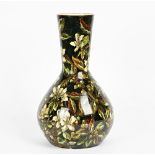 An early Doulton faience vase by Mary Butterton, dated 1877