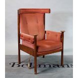 A mid-20th century ash and oak armchair