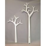 'SKANDIUM SWEDESE', a set of white painted wall mounted coat stands
