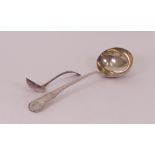 A George III silver King's pattern soup ladle, crest engraved, London 1819, weight 280 gms and...