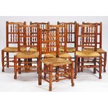 A set of eight 19th century oak rush seat dining chairs (8).