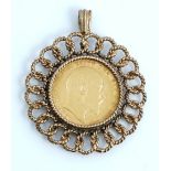 An Edward VII sovereign 1908, in a 9ct gold pendant mount, decorated with a ropetwist border,...