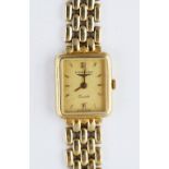 A Longines Quartz 9ct gold lady's bracelet wristwatch.