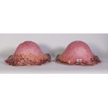 A pair of early 20th century pink frosted glass lamp shades, 32cm wide (2)