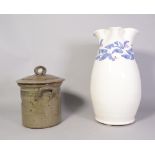 A modern white glazed jug by Heals and a stoneware lidded pot (2)