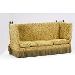 A Knole square back drop arm sofa with tassel frieze, 220cm wide x 113cm high.