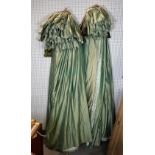 A pair of modern lined and interlined green silk curtains, each 190cm wide x 240cm long, and...