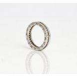 A Bvlgari white gold and diamond full eternity ring, mounted with circular cut diamonds, the...