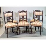 A set of six Edwardian mahogany semi-upholstered dining chairs