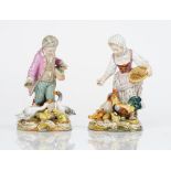 A pair of Meissen figure groups late 19th century, modelled as a boy and girl feeding...
