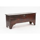 A 17th century oak five plank coffer with chip work decoration on slab end supports, 126cm...