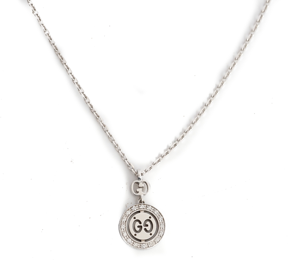 A Gucci white gold and diamond set pendant necklace, the front with a circular drop mounted... - Image 2 of 3