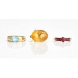 Three gold and gem set rings, (3).