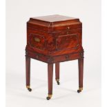 A George III mahogany caddy top square cellarette