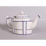 A Castleford salt glaze shaped teapot, circa 1800, banded in blue, 28cm across