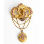 A Victorian foil backed pink gemstone set brooch, of four section entwined design, the front...