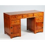 A 20th century Chinese hardwood pedestal desk with five drawers about the knee, 142cm wide x...