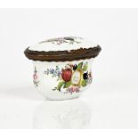 A German porcelain snuff box, 19th century, oval form with waisted sides, painted with fruit,...