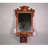 A late George III walnut pier mirror, 40cm wide; 65cm high