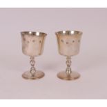 A pair of silver goblets, (2).