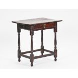 A 17th century and later oak single drawer side table, on baluster turned supports, united by...