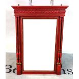 A red painted parcel gilt rectangular mirror